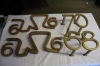 Brass logos used for Winthrop Rockefeller's campaign bus (wr-173)